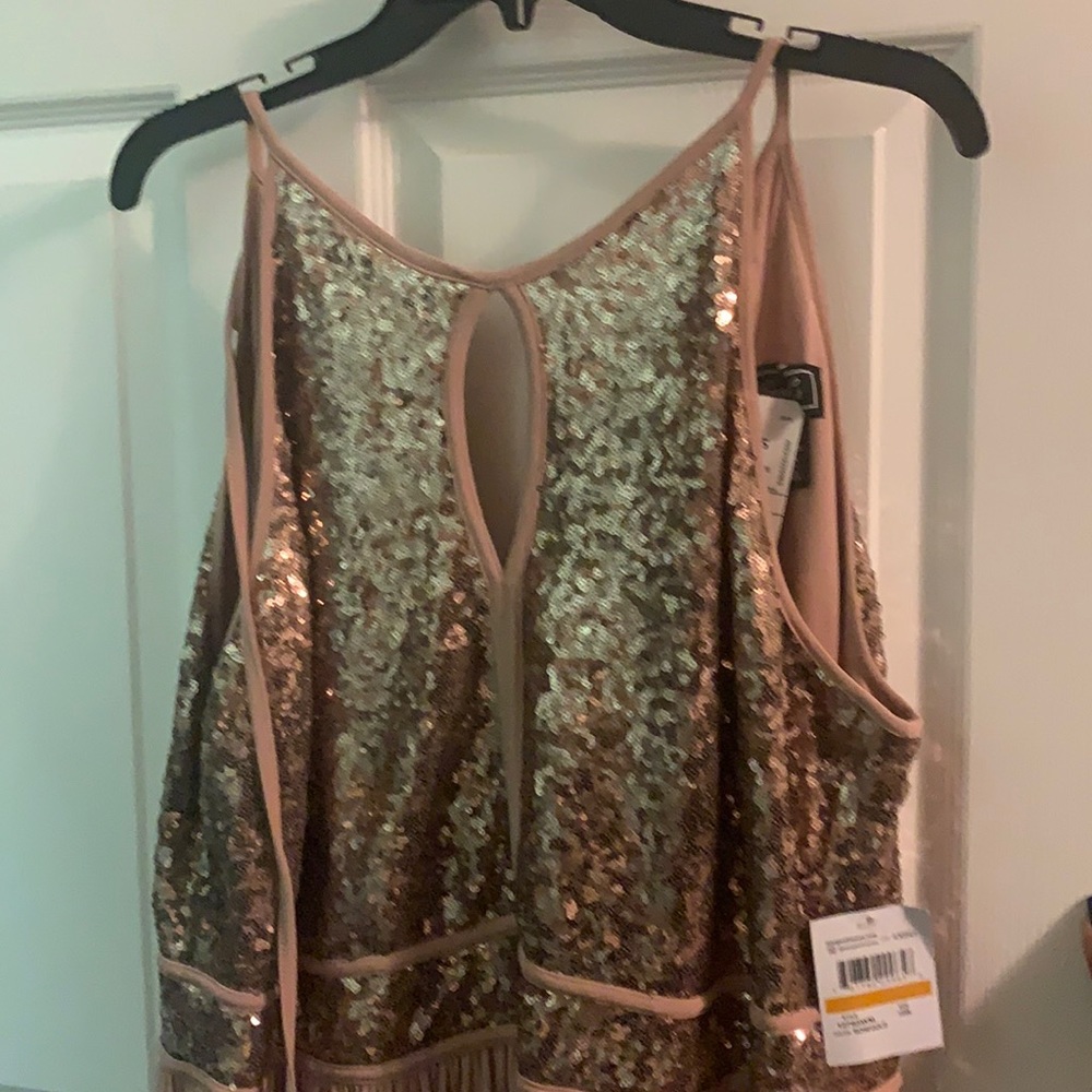 Rose gold long gown. Perfect for a wedding or semi formal event NBW